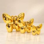 Trio de papillons décoratifs dorés – Image 2