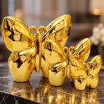 Trio de papillons décoratifs dorés – Image 3