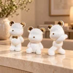 Trio d’ours décoratifs en céramique — Blanc et or