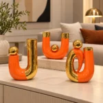 Trio de vases tubulaires orange et or